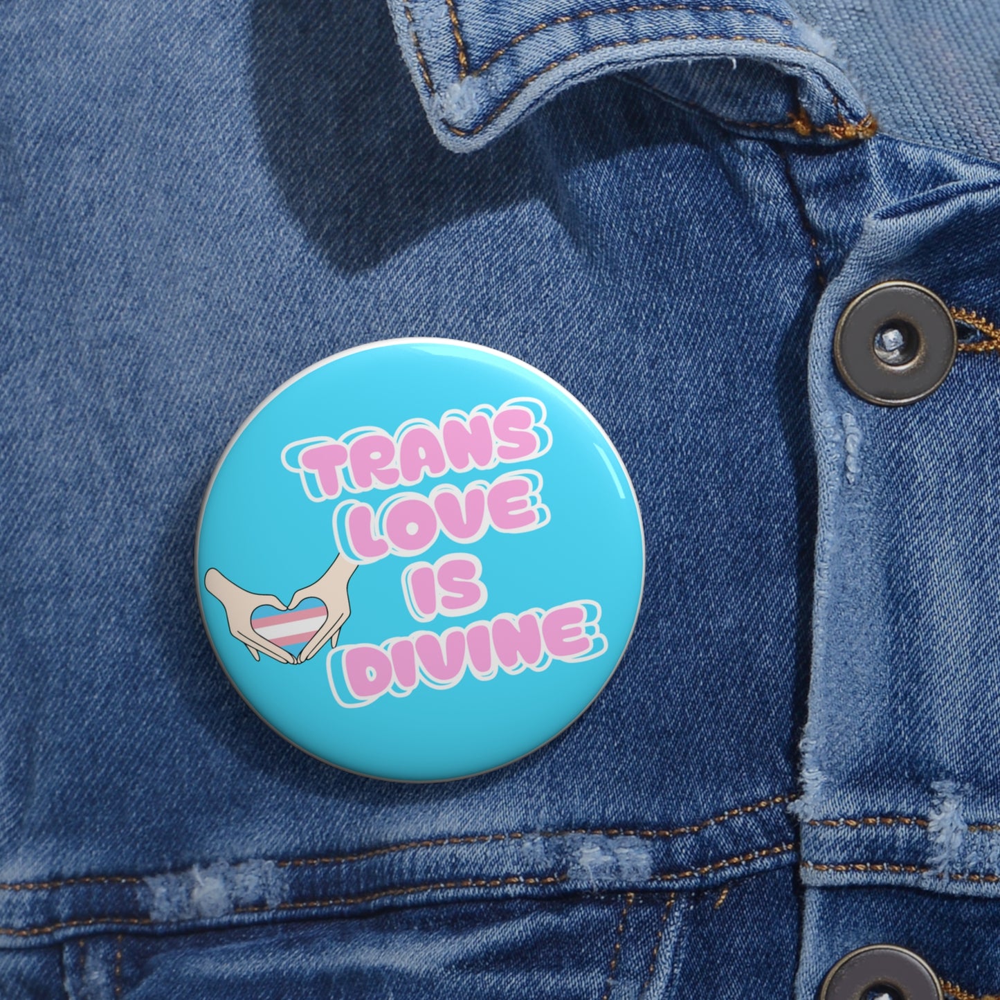Trans love is divine pinback button